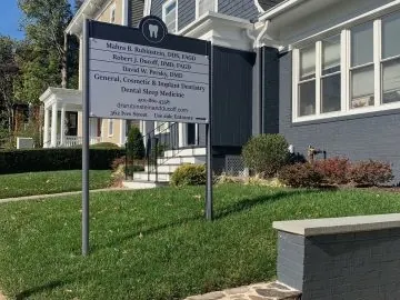 The practice's sign on the lawn at 362 Ives Street, listing Dr. Rubinstein, Dr. Ducoff and Dr. Persky and pointing patients to the side entrance.
